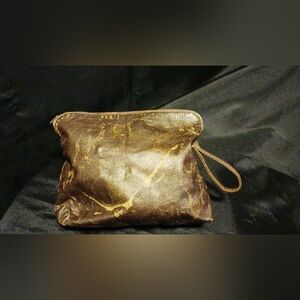 Vintage Bugatti gold wristlet